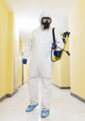 Jyoti Pest Control technician in protective gear
